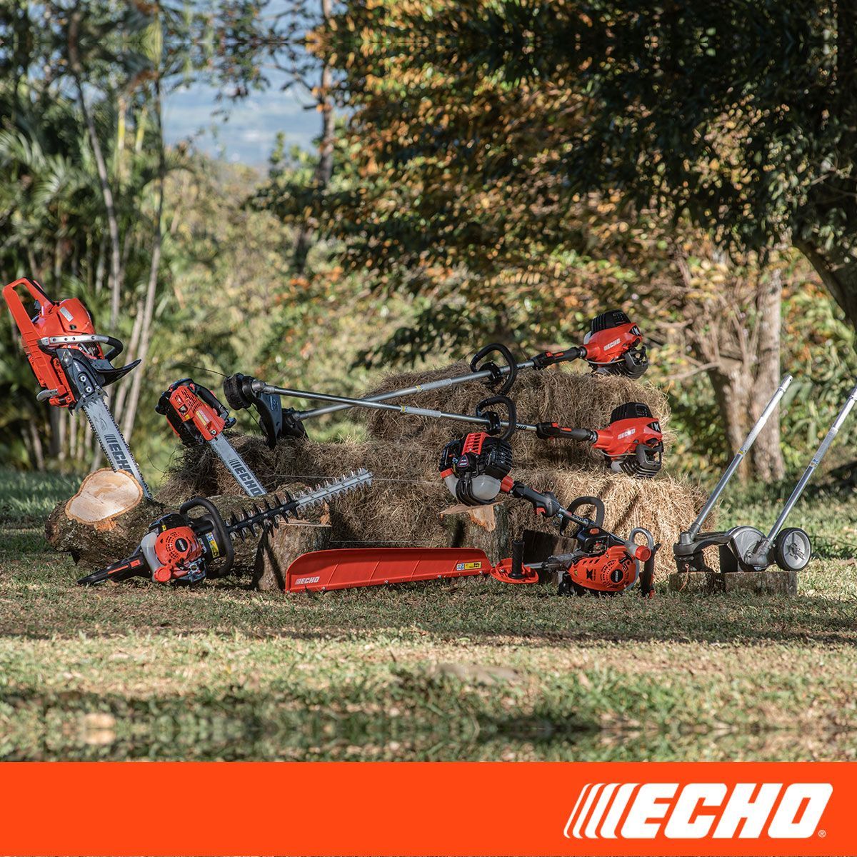 A bunch of echo tools are sitting on top of a pile of hay.