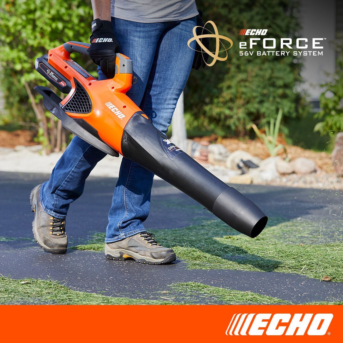 A person is holding a echo eforce 32v battery blower.