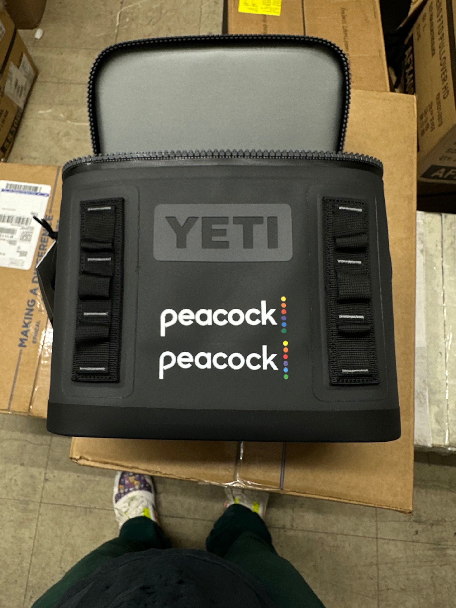a Yeti machine is sitting on top of a cardboard box