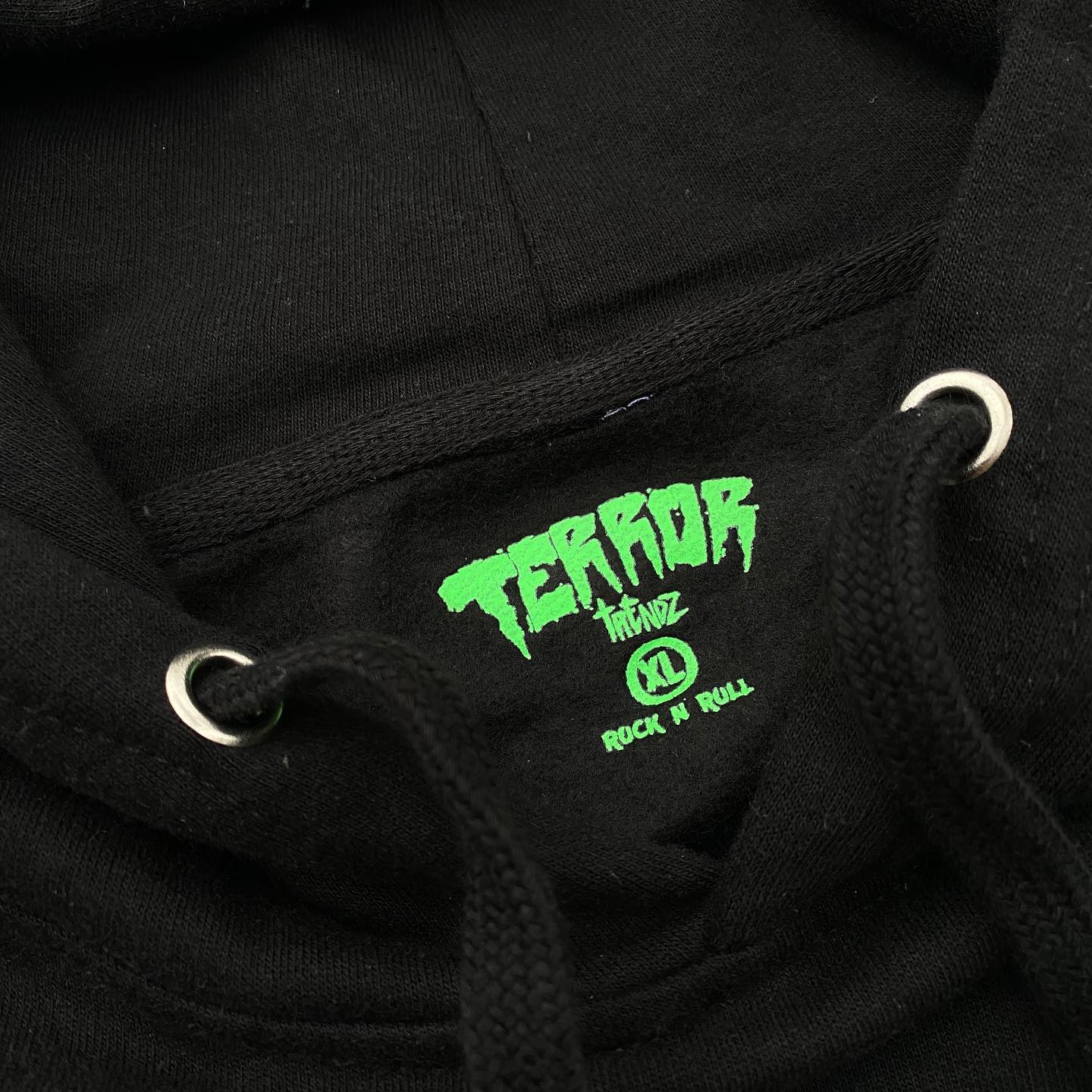 a black hoodie with a label that says Terror