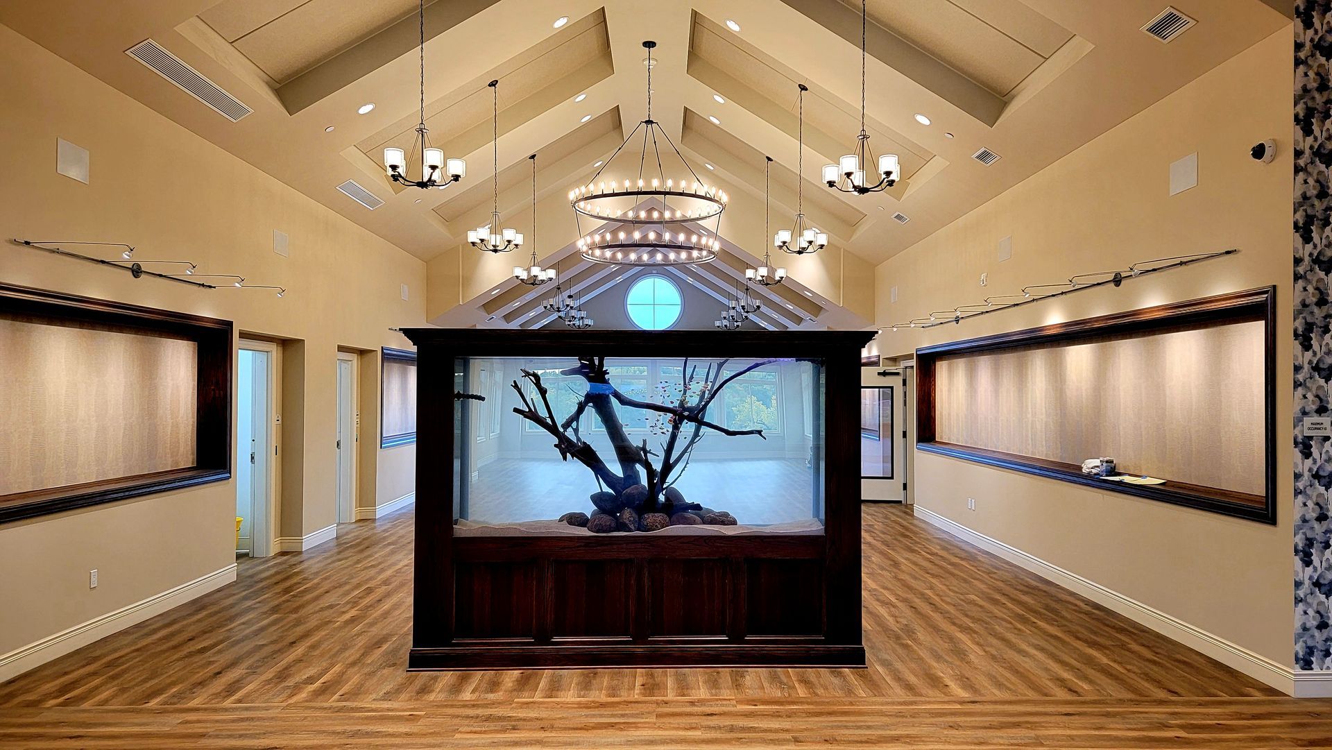 There is a large aquarium in the middle of the room.