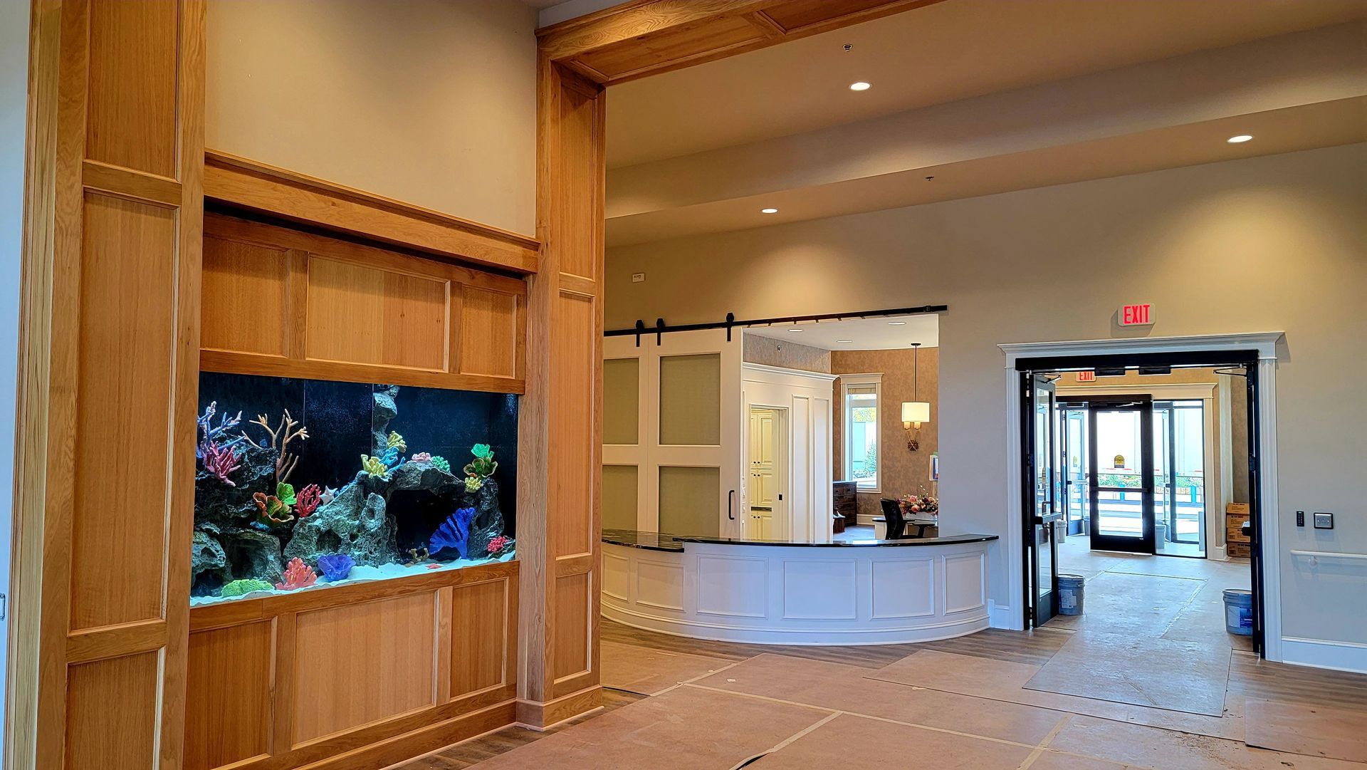 There is a large aquarium in the middle of the room.