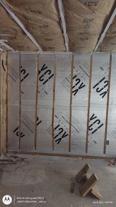 A room with a lot of insulation on the walls and ceiling.