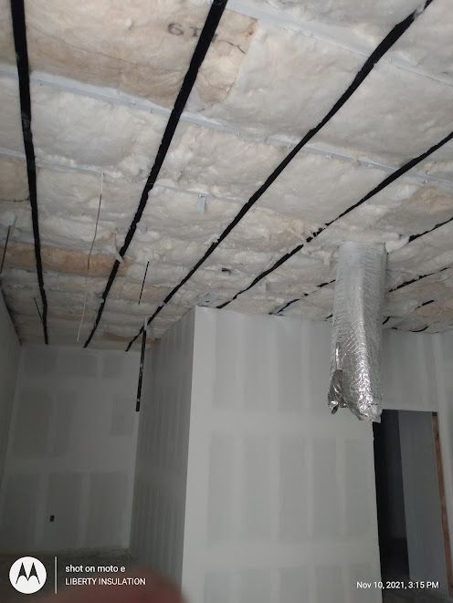 A room with a ceiling that is being remodeled.