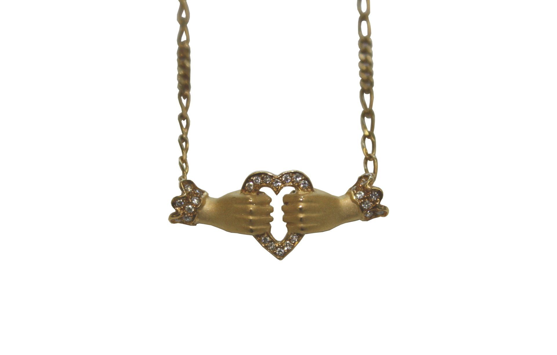 hands with heart necklace