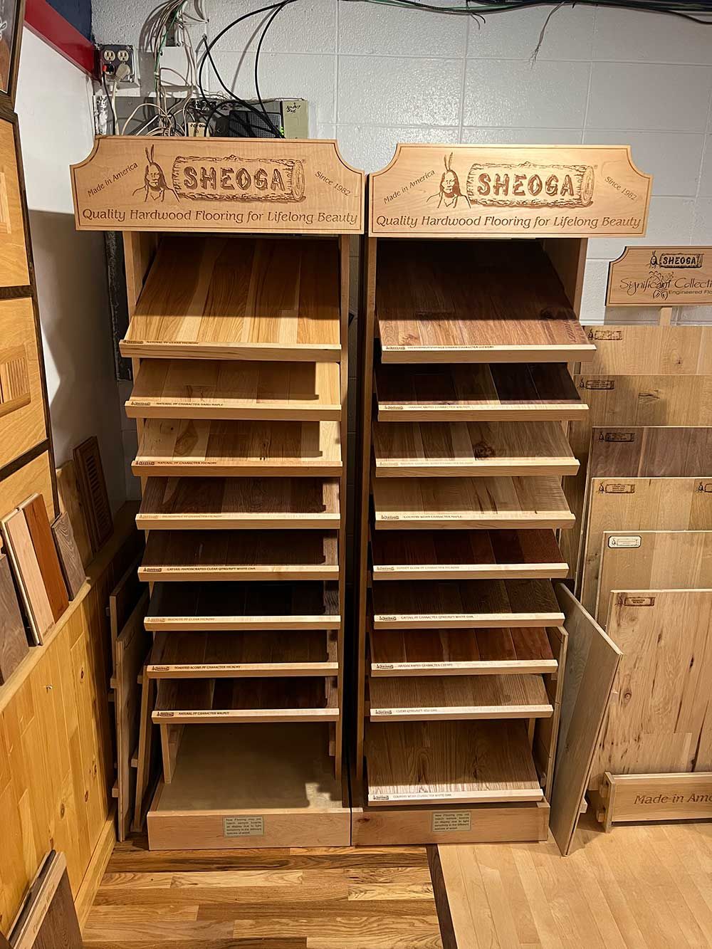 Two wooden shelves are sitting next to each other in a room.