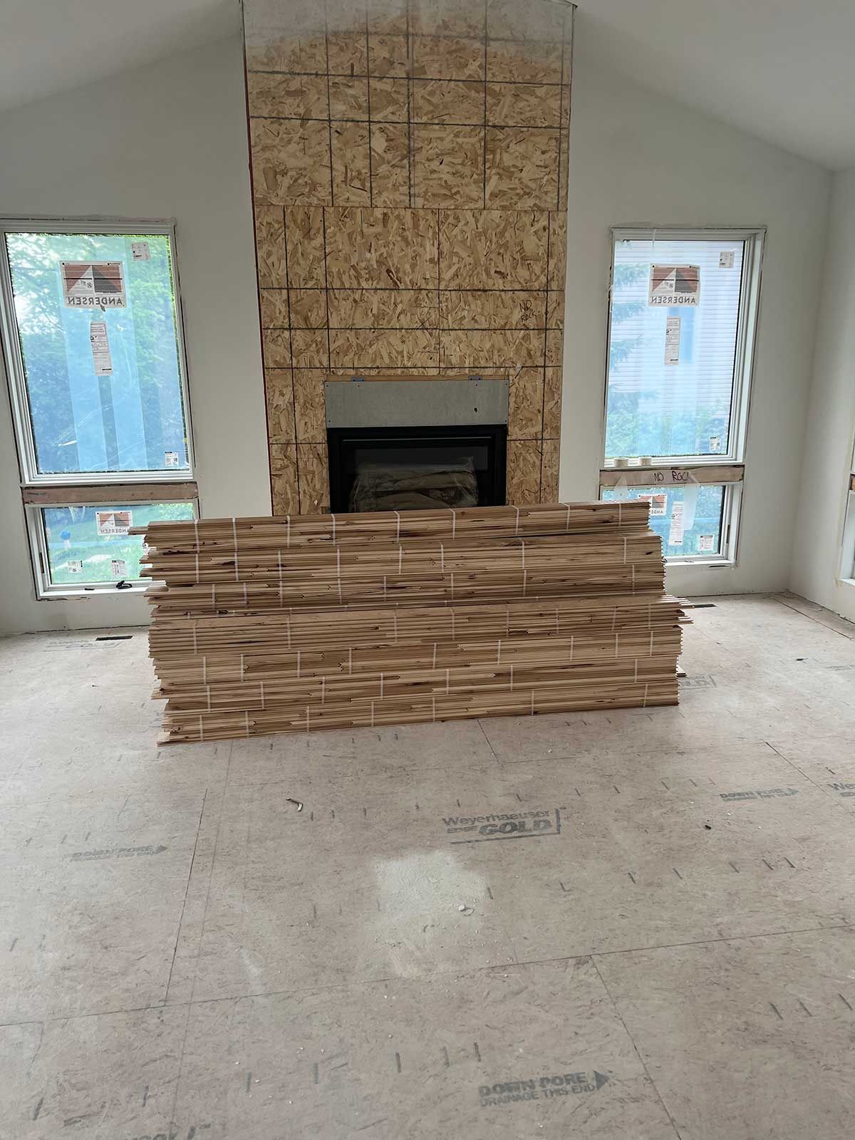 There is a fireplace in the middle of the room.