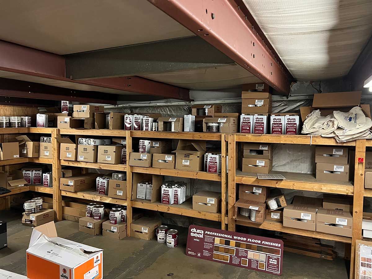 A warehouse filled with lots of boxes and shelves.