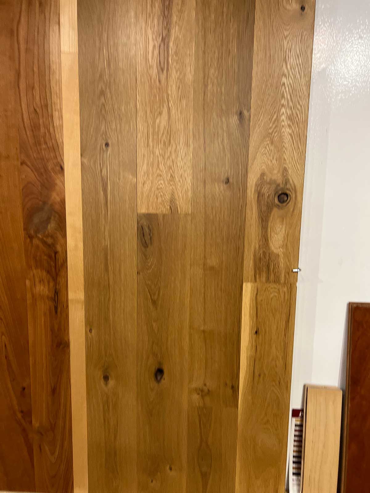 A close up of a piece of wood sitting on top of a table.