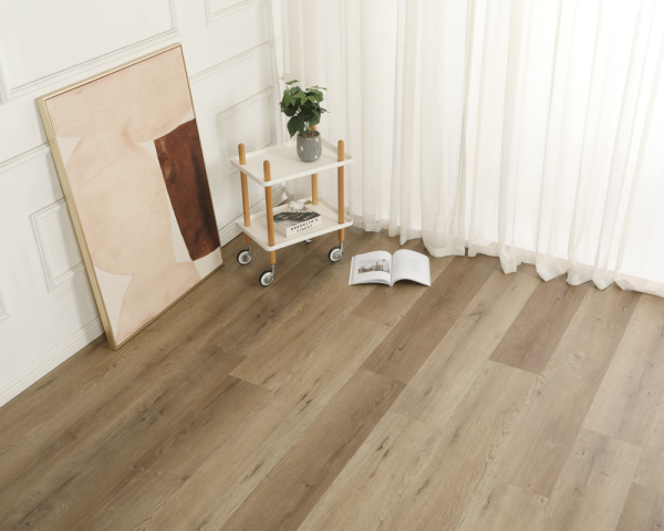 Wooden floor in bright room with painting, plant on rolling cart, and open book near curtain.