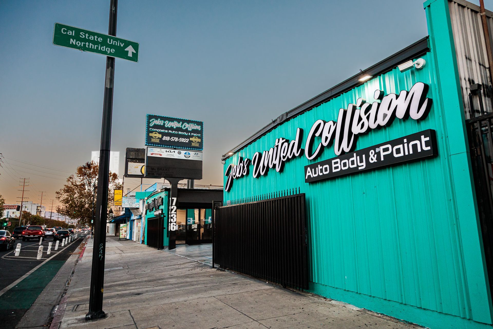 A blue building with the word collision on it