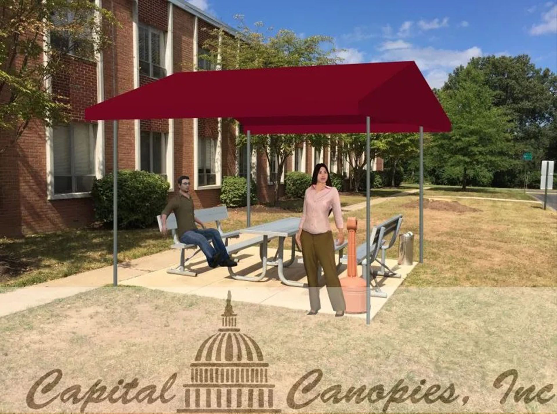 Red canopy tent over patio seating beside a brick building with two people under it