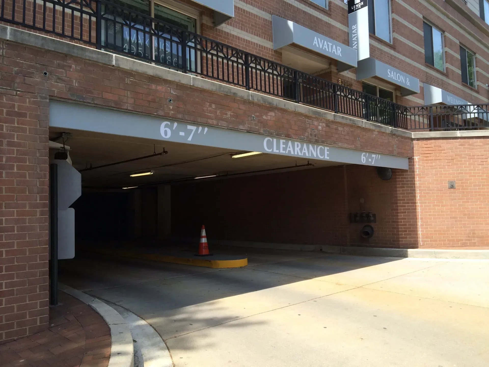 Apartment parking garage entrance with 6'7