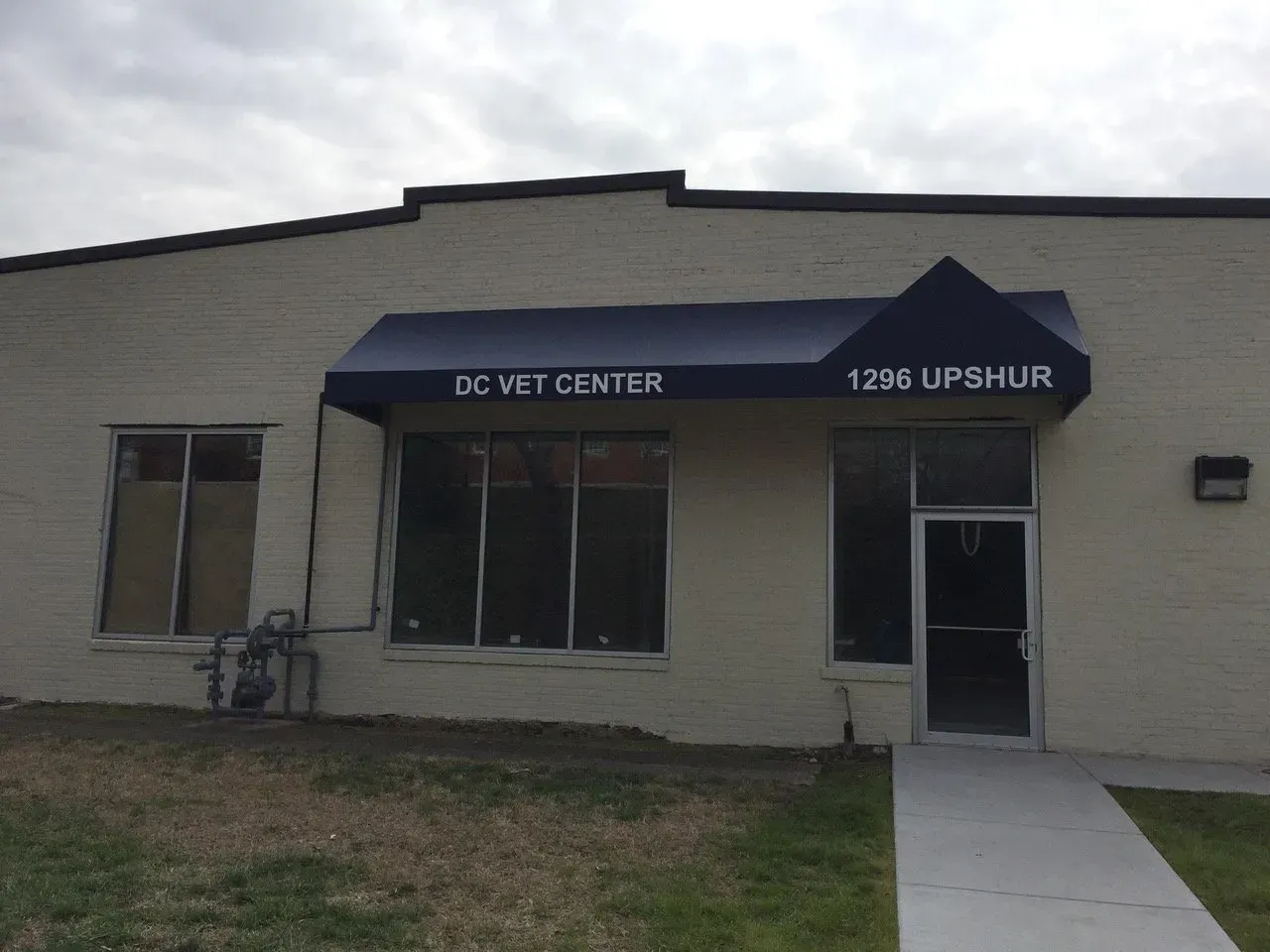 DC Vet Center storefront with blue awning and entrance at 1235 Upshur