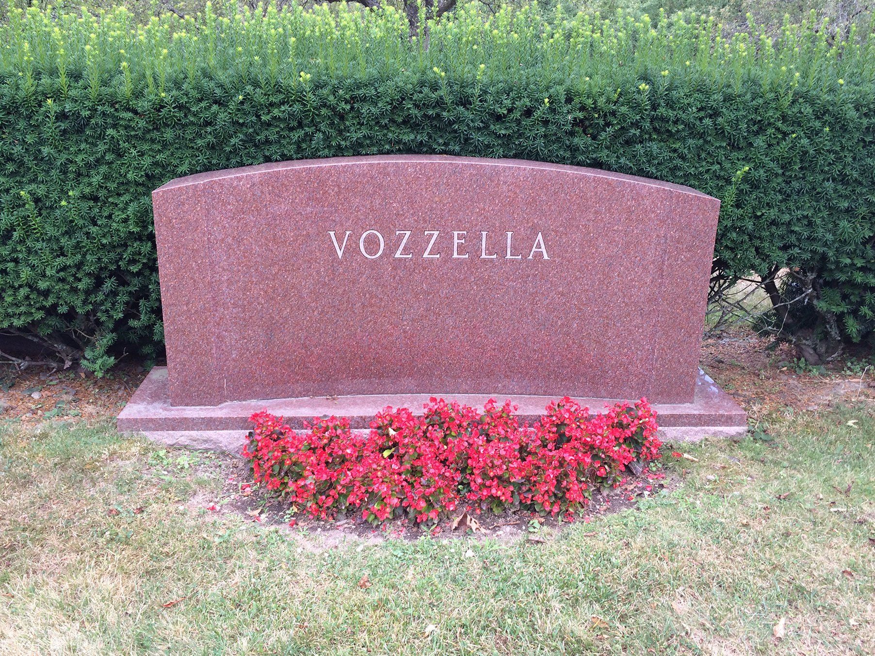 Vozzella indian red gold lettering