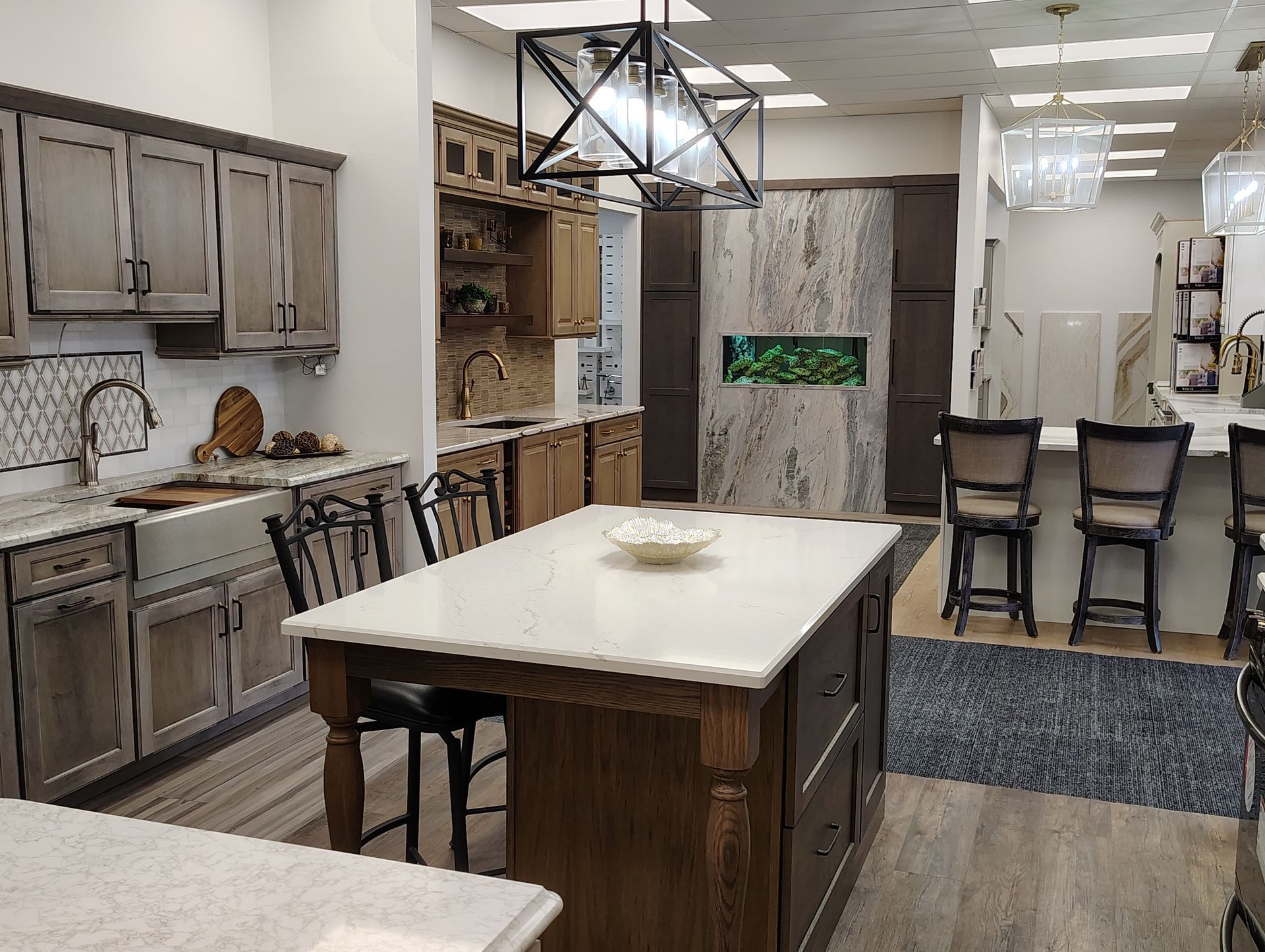 There is a large island in the middle of the kitchen