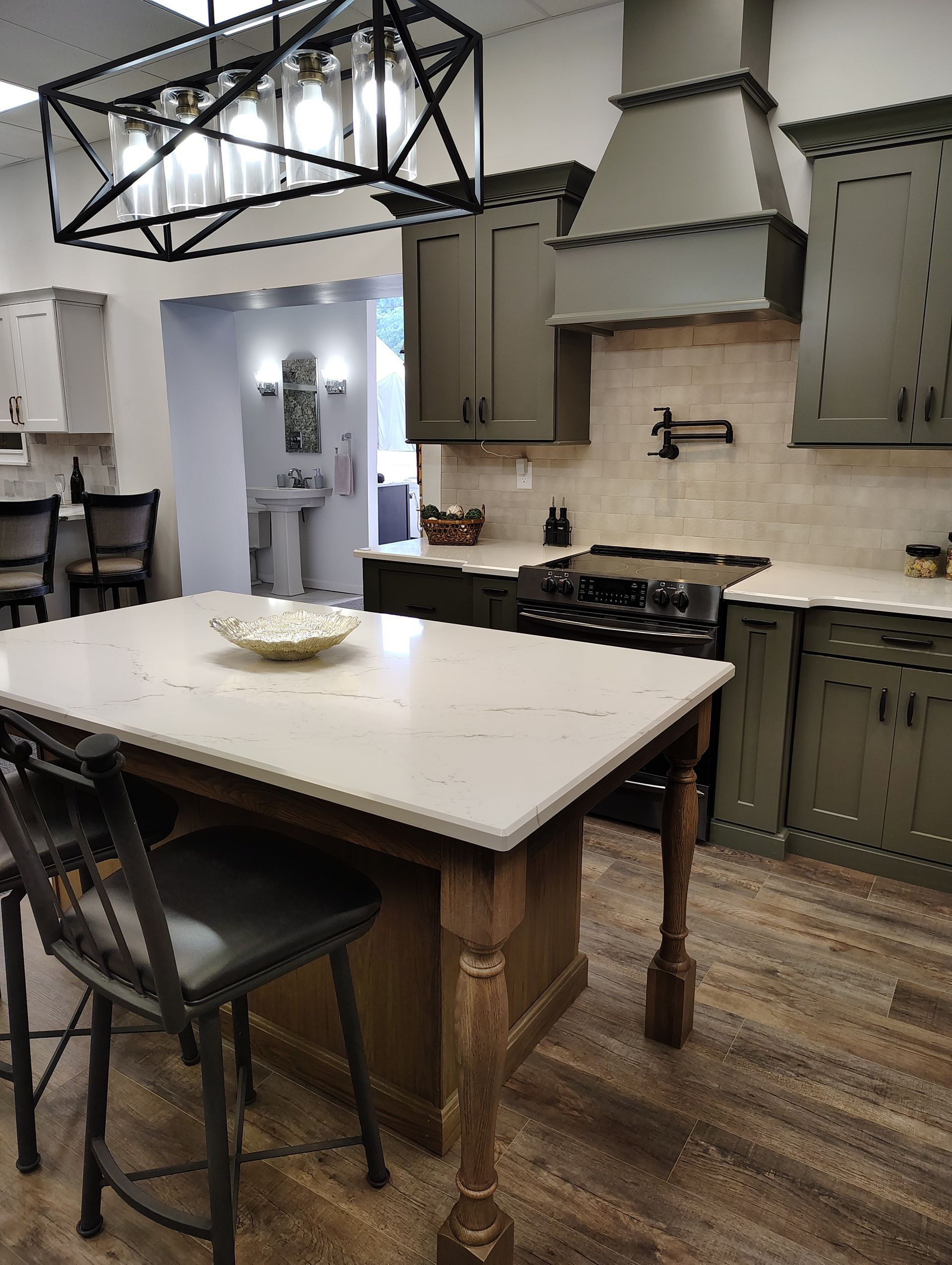 A kitchen with a large table and chairs and a stove