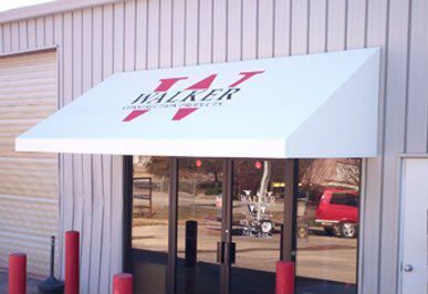 A white awning with the word walker on it