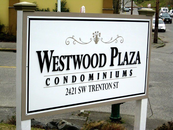 A sign for westwood plaza condominiums on trenton st