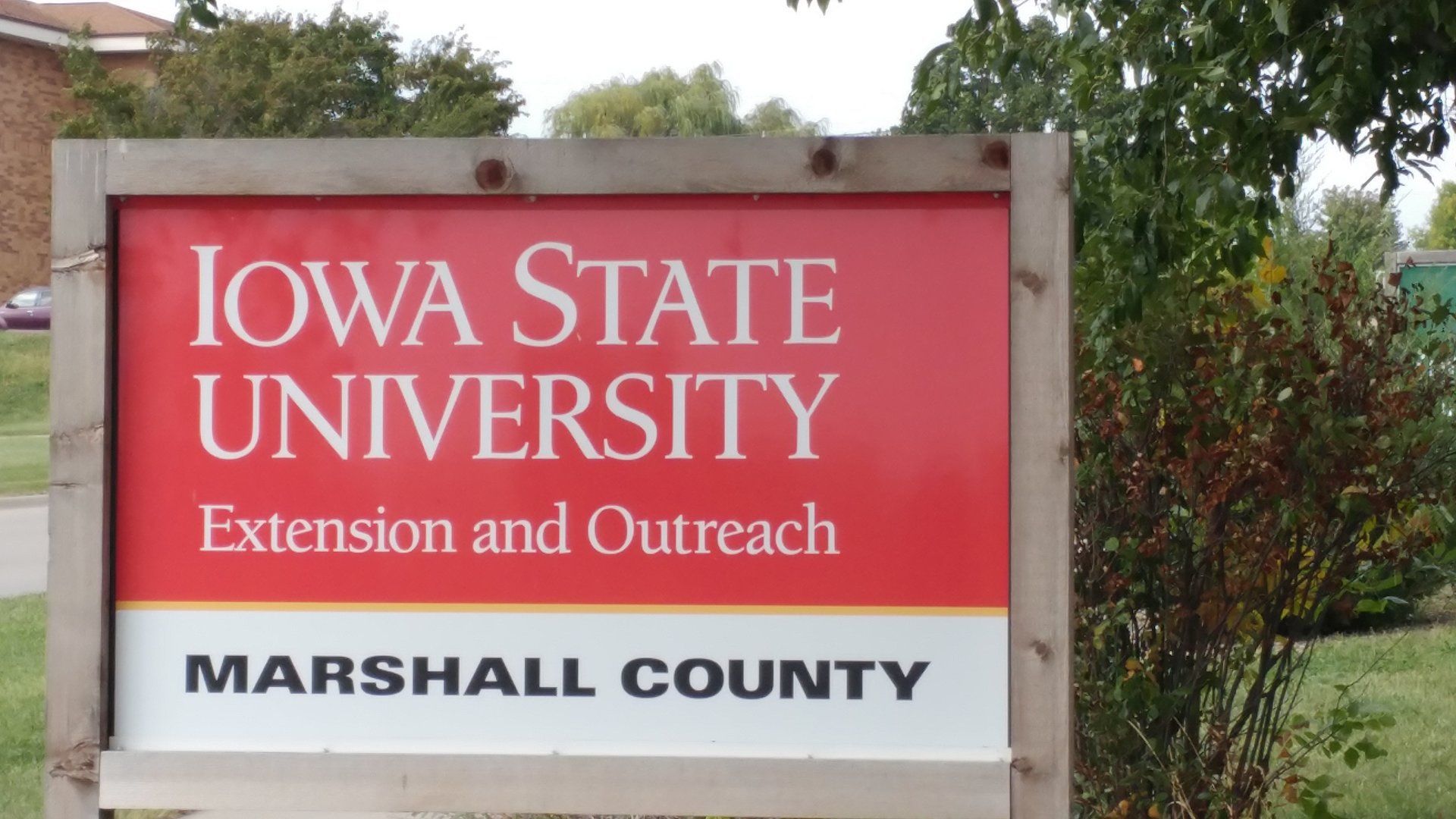 A sign for iowa state university in marshall county