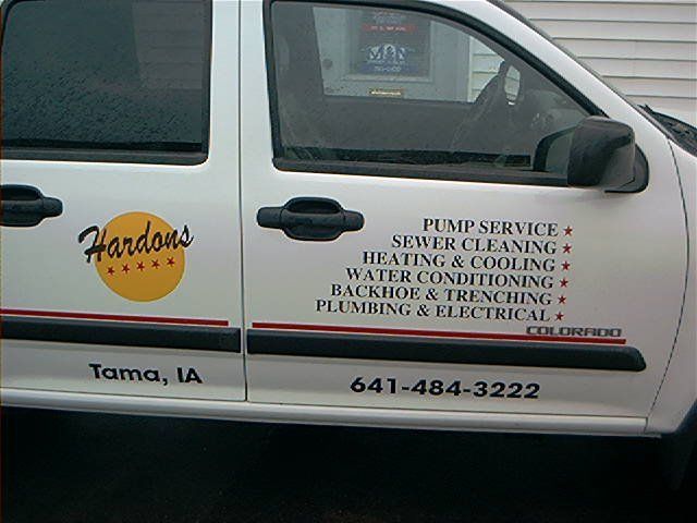 A white van with the word hardons on the side