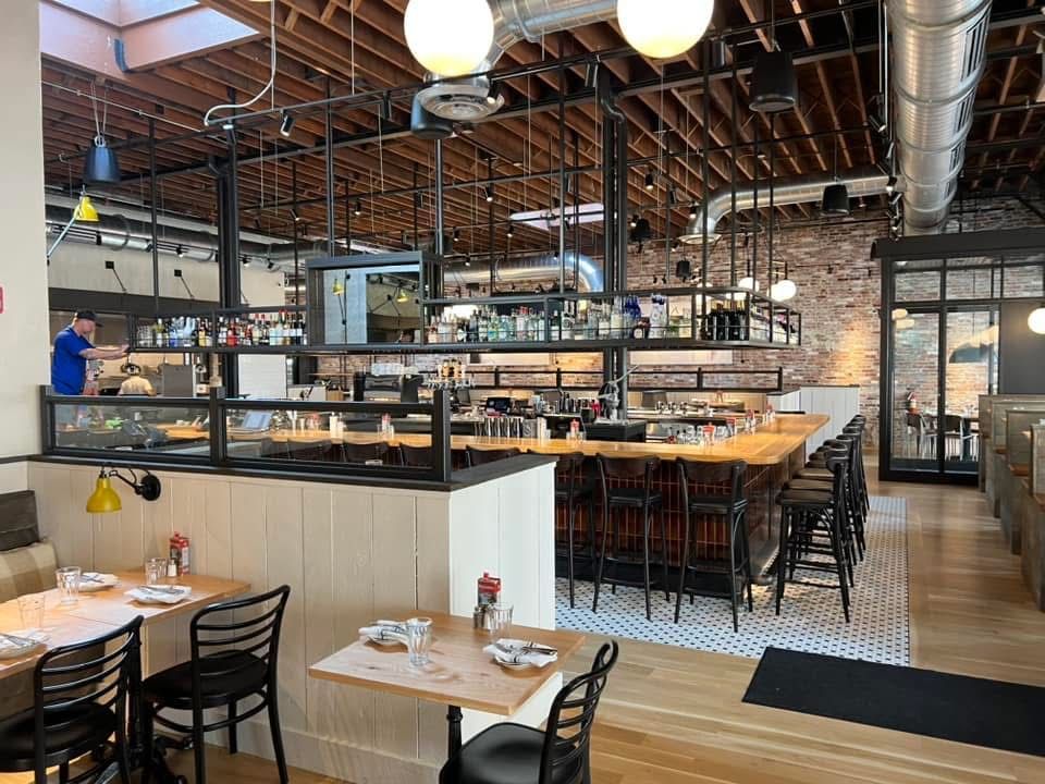 Restaurant interior with bar and tables