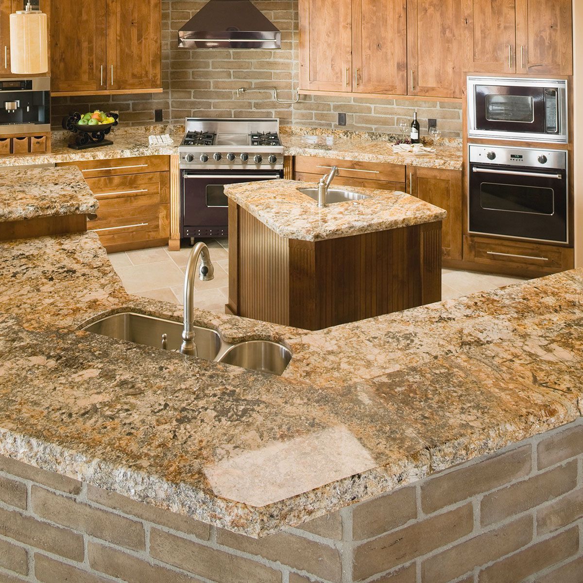 A kitchen with quartz countertops and wooden cabinets