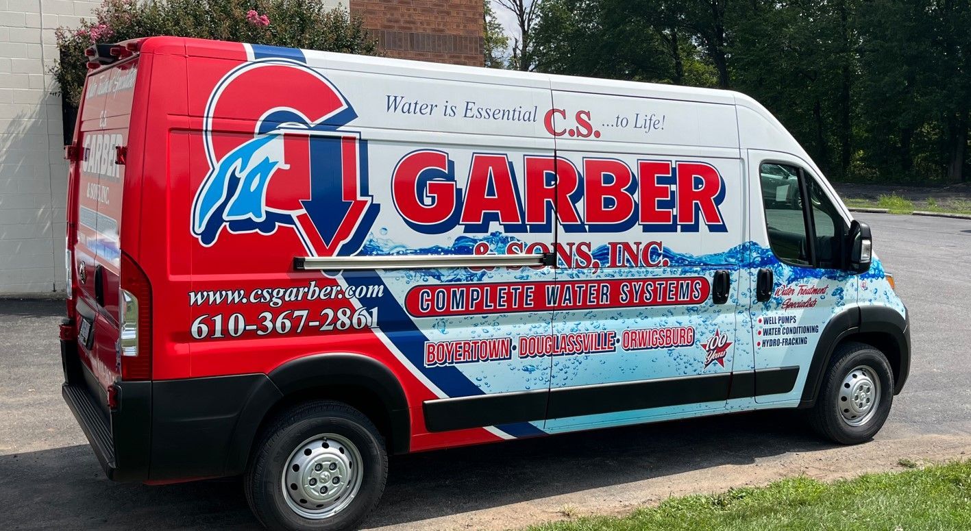 A Garber van is parked in a parking lot