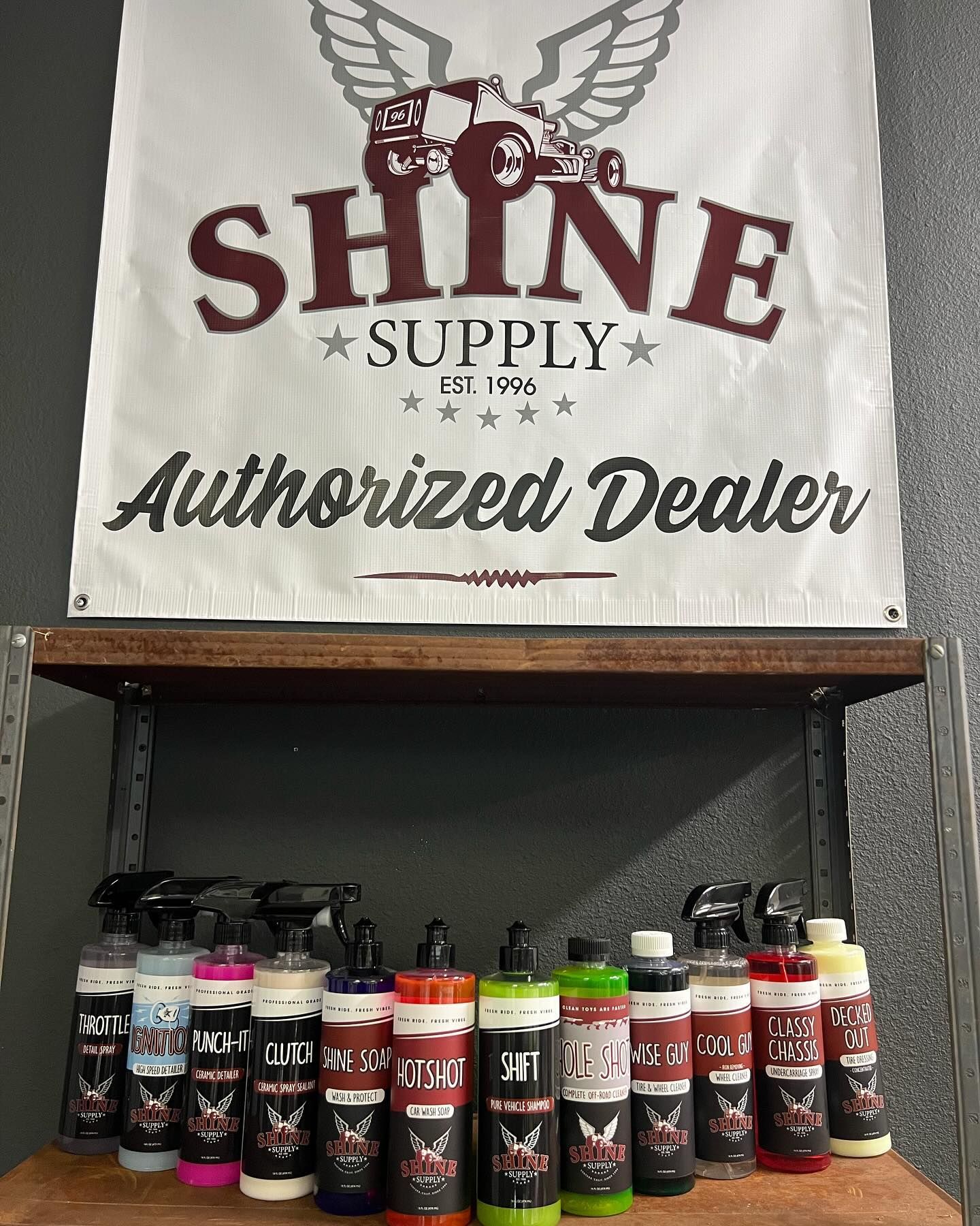 Shelf with Shine Supply products under a banner reading 