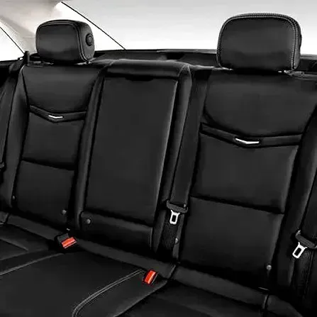 Black leather car rear seat covers with headrests and red seatbelt buckles