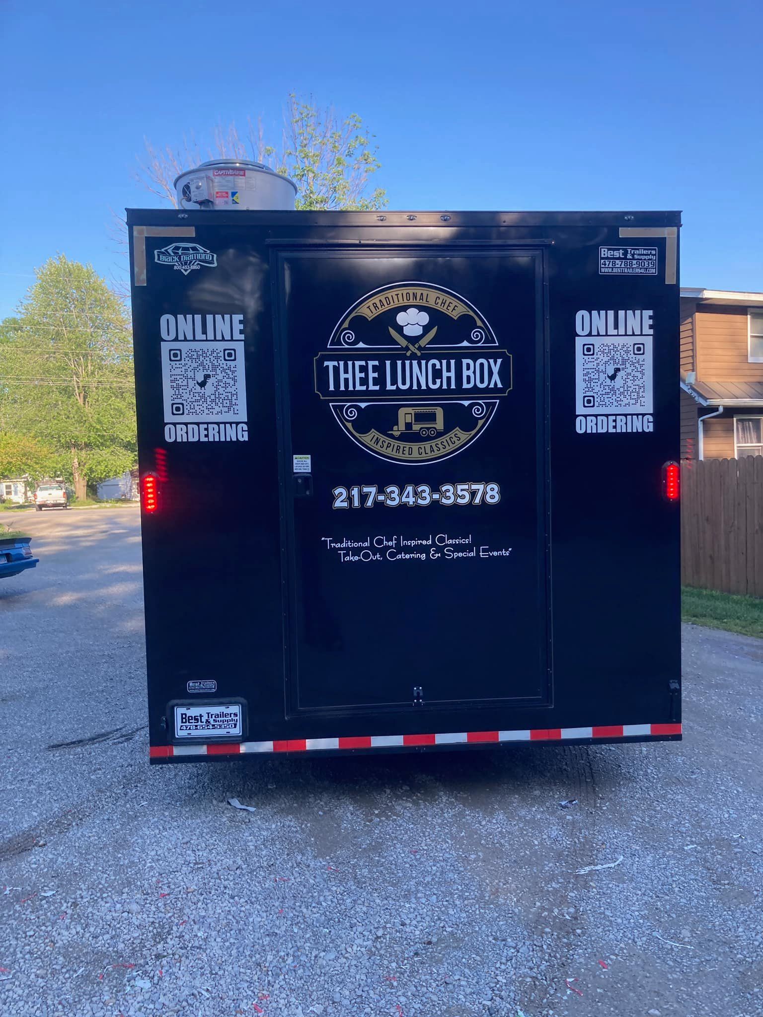 Black food truck wrap side view