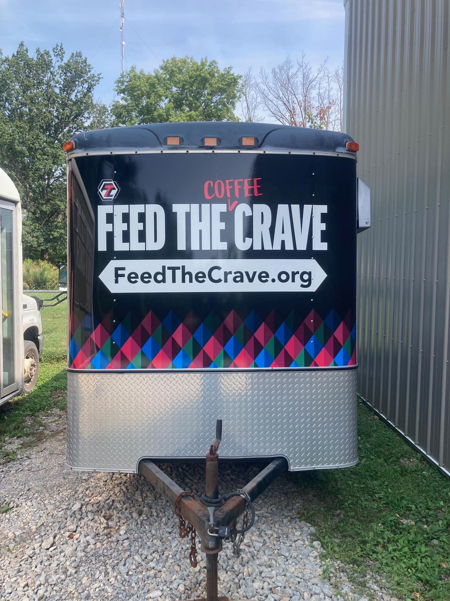 Feed the crave food truck wrap rear view