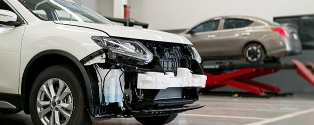 Car front under repair