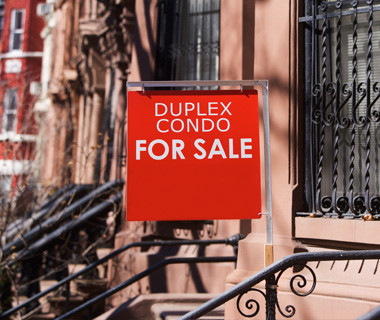 Duplex Condo For Sale sign board