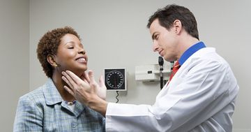 Doctor checking up a woman