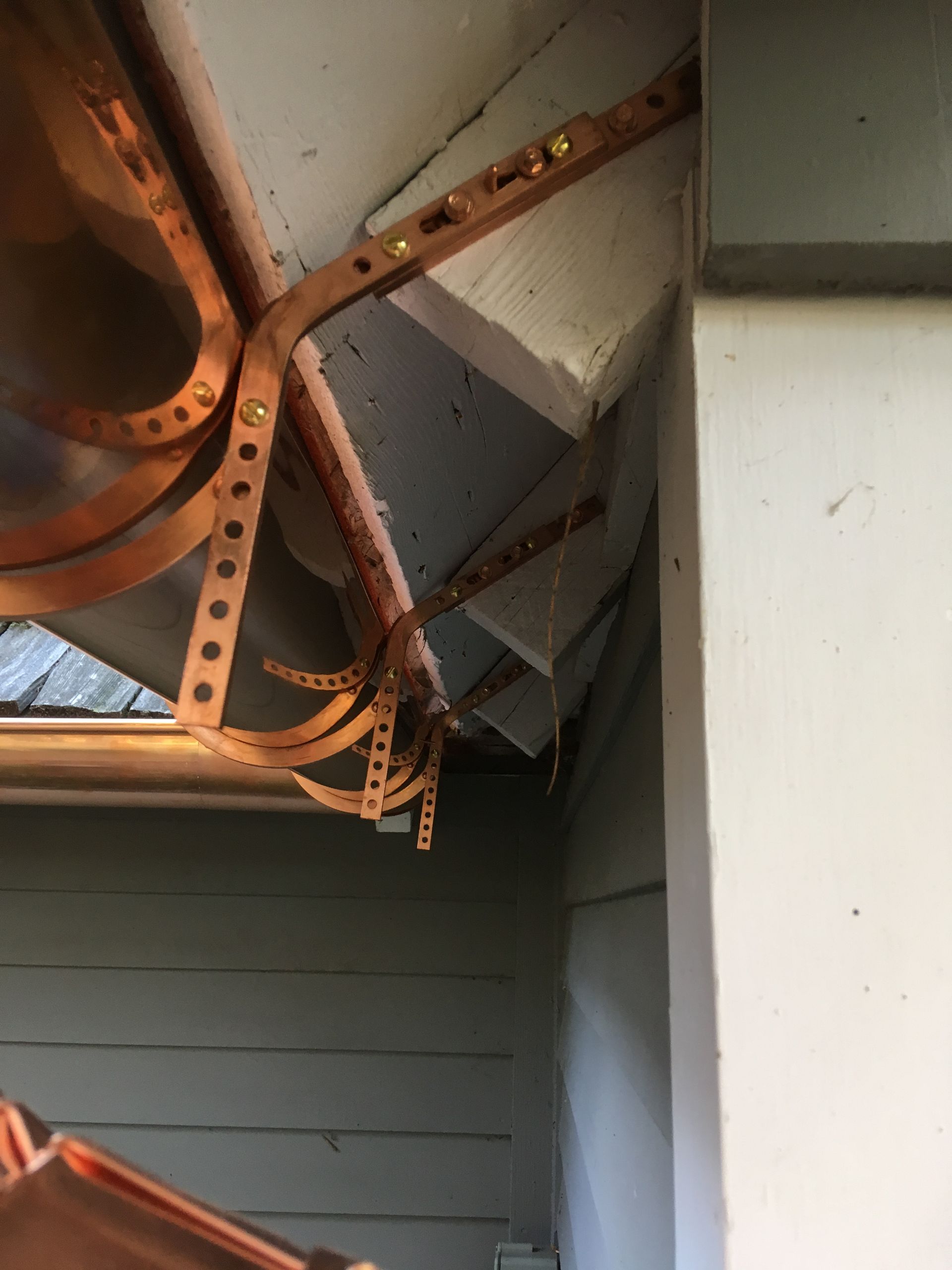 A roof mount copper gutter hangers.