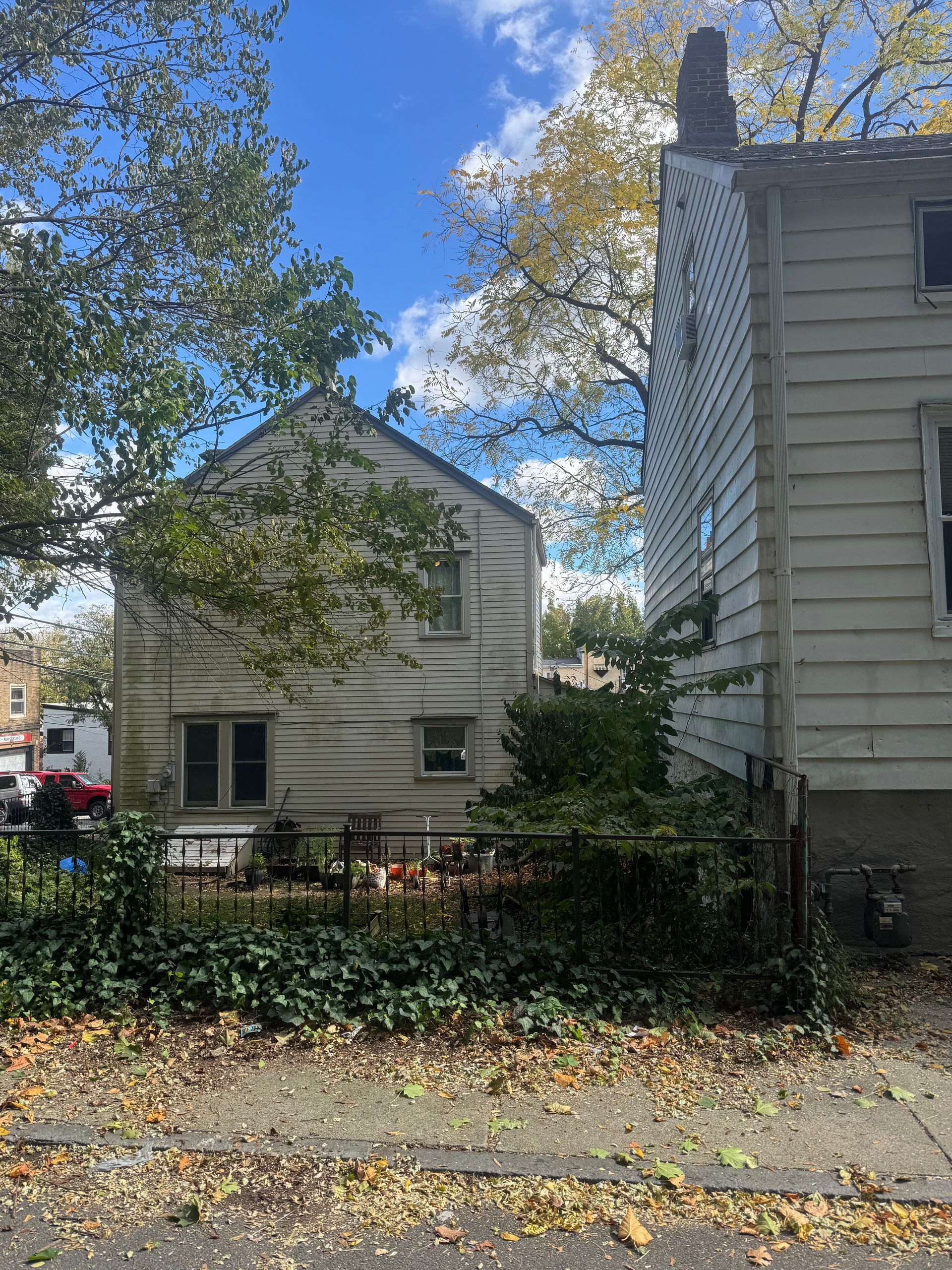 A couple of houses sitting next to each other on a sunny day.