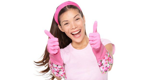 Woman in cleaning gloves