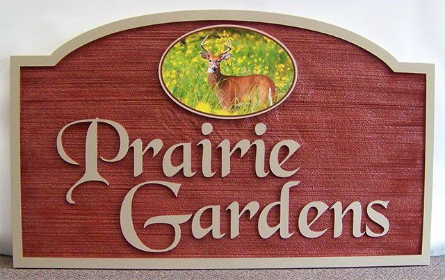 A sign for prairie gardens has a picture of a deer on it