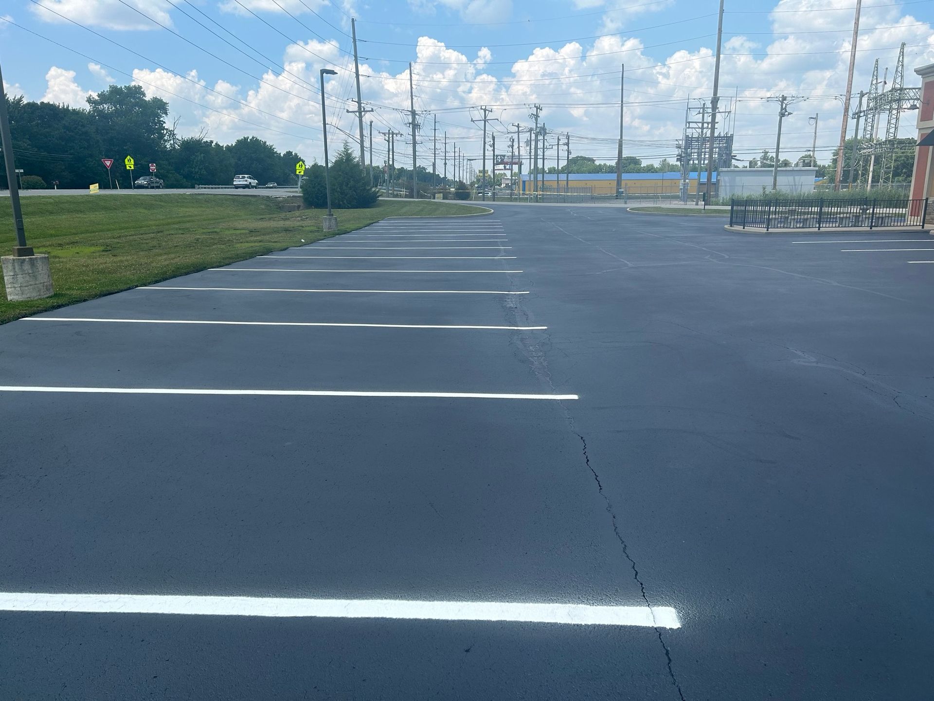 A parking lot with a lot of white lines on it
