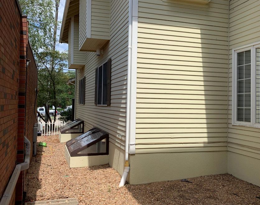 A house with a lot of windows and siding