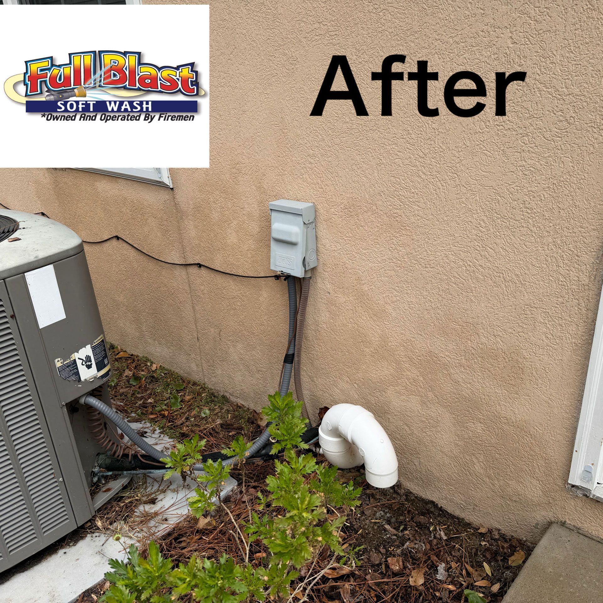 After: exterior wall, utility meter, HVAC unit, and white drain pipe above a mulched bed.