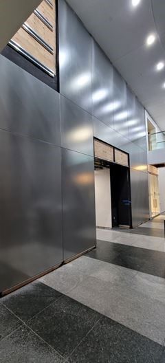 A large hallway with a checkered floor