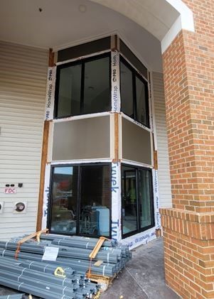 A building with a lot of windows is being built