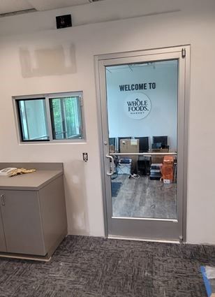 A room with a glass door installed