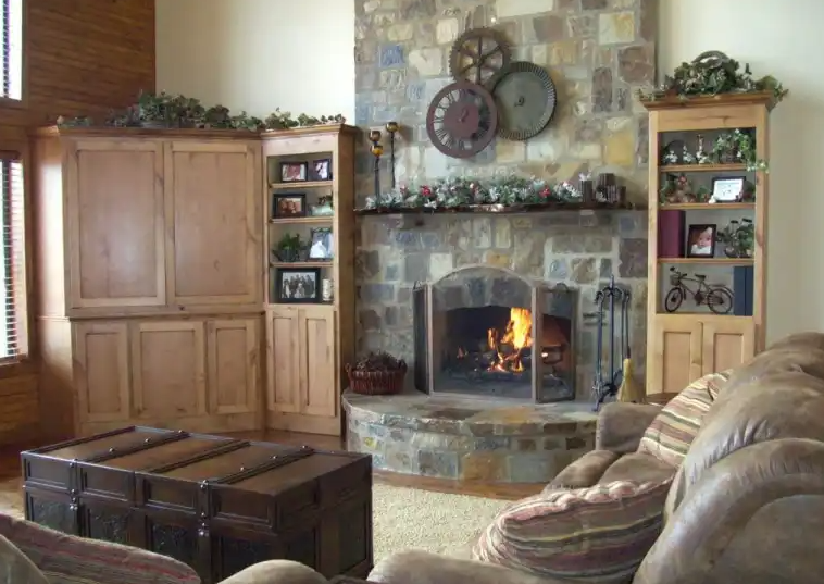 A living room with a fireplace and a couch