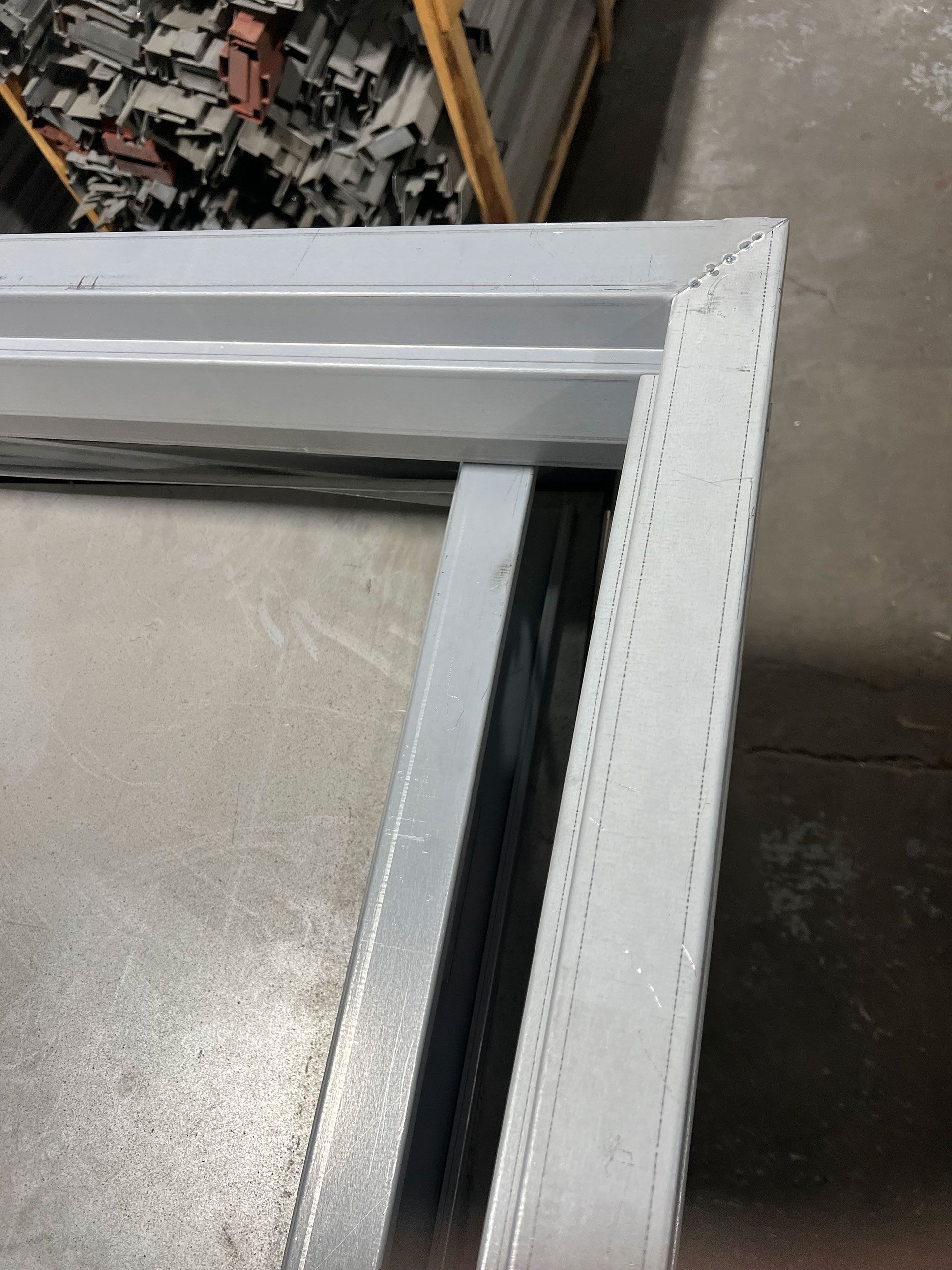 A close up of a metal frame with holes in it