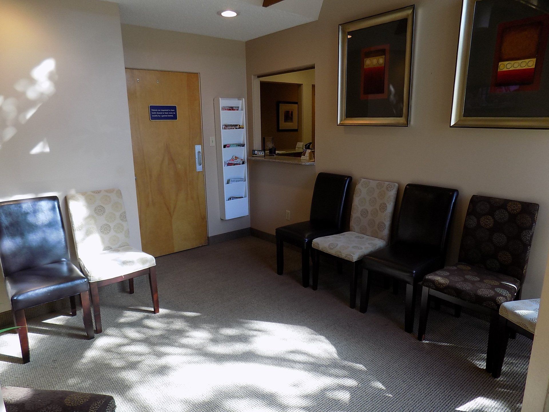 Young man holding clear bracket