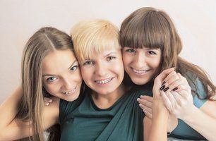 Beautiful girl with dental braces at the reception at the dentist.