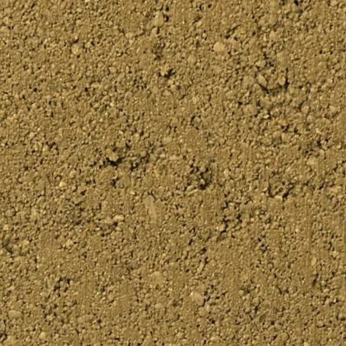 Close-up of brown, coarse soil with small pebbles and irregular texture.